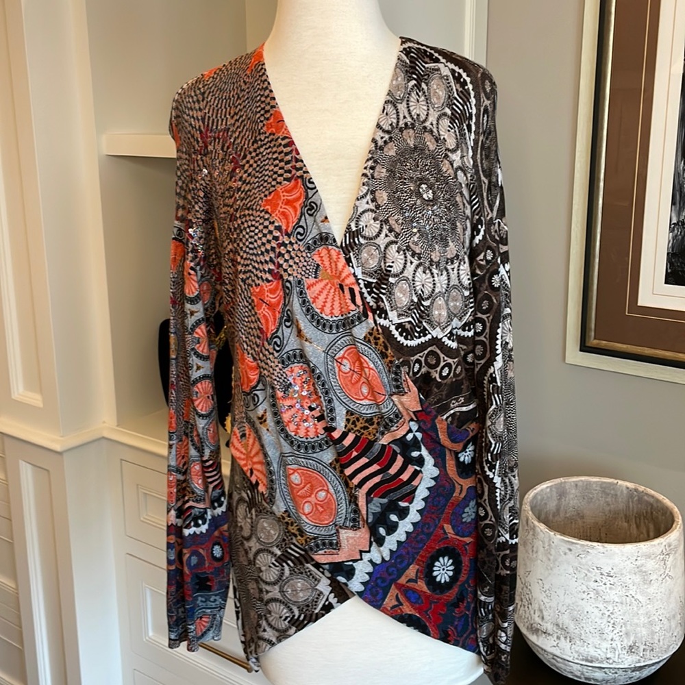 Beautiful faux wrap sweater.